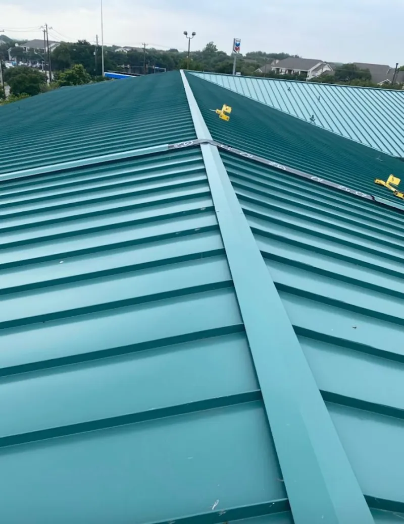 Green commercial metal roof ridge and valley for Metal Roof Repair in Yelm